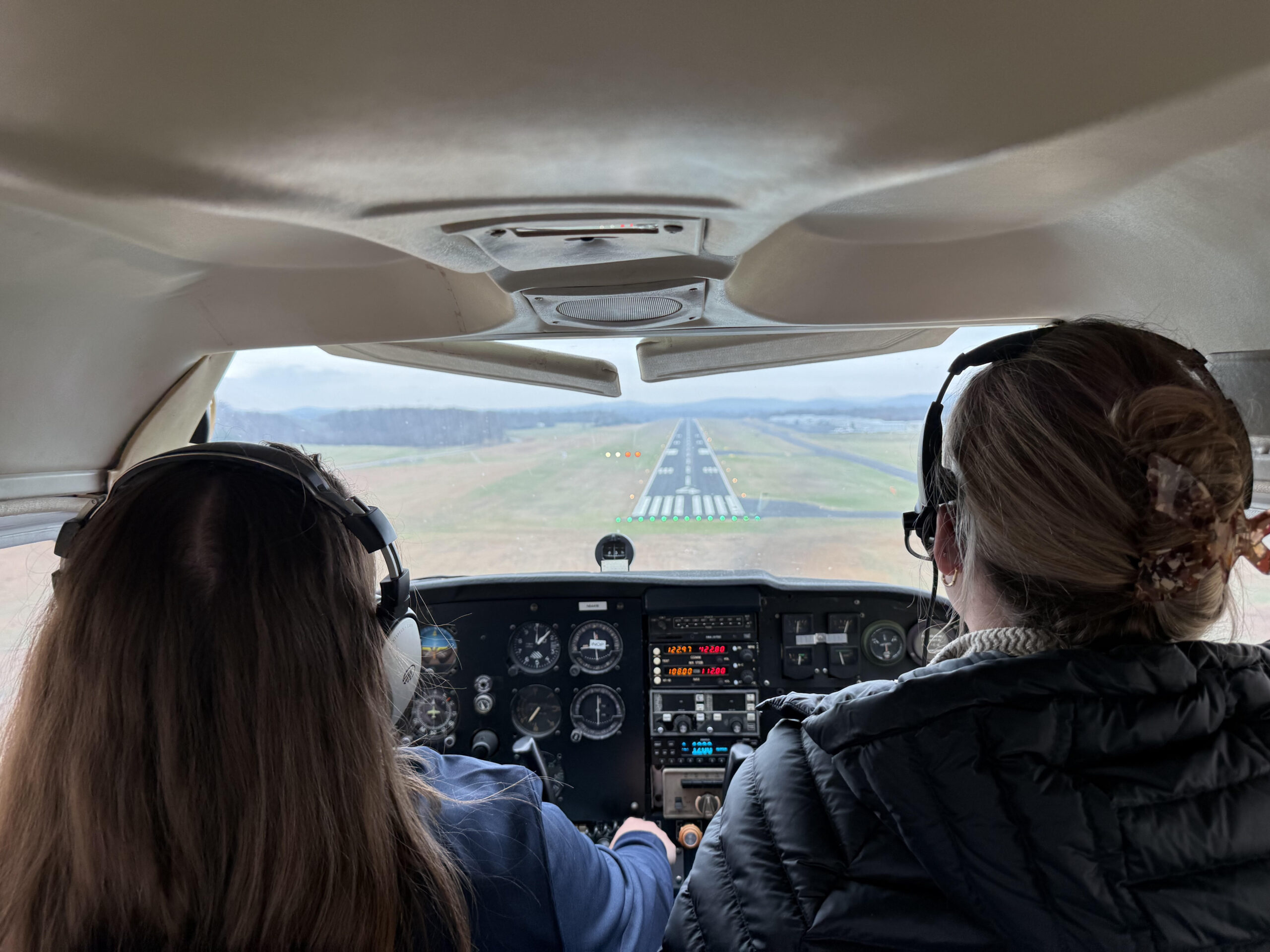 Instructor and student in cockpit.